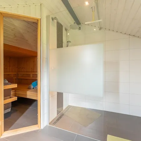 4 Personen Luxusferienhaus Mit Sauna, Kaminofen, Klimaanlage, Kanu Und Seeblick In Otterndorf