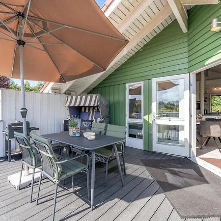 4 Personen Luxusferienhaus Mit Sauna, Kaminofen, Klimaanlage, Kanu Und Seeblick In Otterndorf