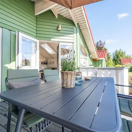 4 Personen Luxusferienhaus Mit Sauna, Kaminofen, Klimaanlage, Kanu Und Seeblick In * Otterndorf