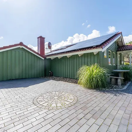 4 Personen Luxusferienhaus Mit Sauna, Kaminofen, Klimaanlage, Kanu Und Seeblick In * Otterndorf