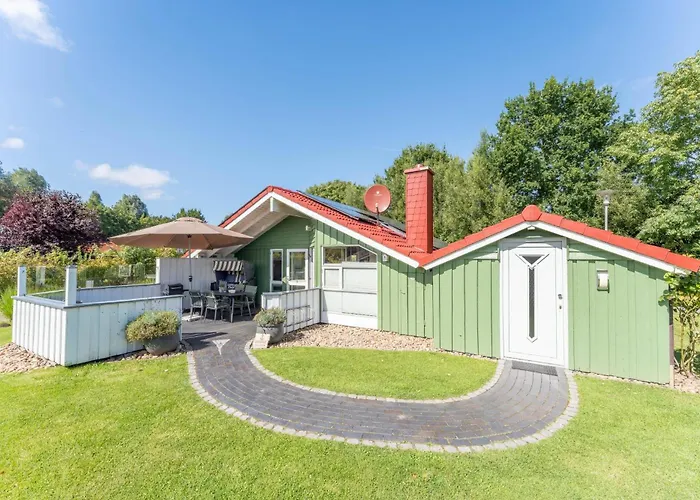 Σπίτι διακοπών 4 Personen Luxusferienhaus Mit Sauna, Kaminofen, Klimaanlage, Kanu Und Seeblick In Otterndorf